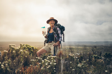 Female hiker relaxing during a trek