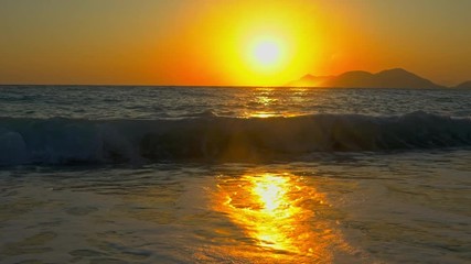 Canvas Print - beautiful sunset above the mediterranean sea. beautiful marine landscape. view of sea waves slow mot