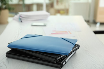 Wall Mural - Stack of folders with documents on office table. Space for text