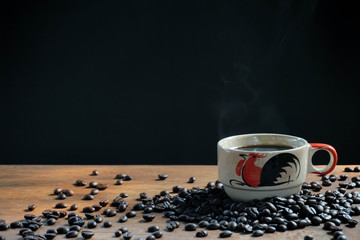 Coffee hot cups with smoke and coffee beans.