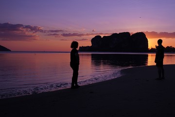 Poster - couple on the beach at sunset