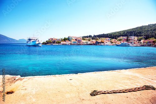 Beautiful scenic landscape with bay and ferry in Nydri, Lefkada, Greece. Stun...