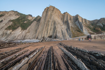 Wall Mural - amazing sunset landscape at rocky beach