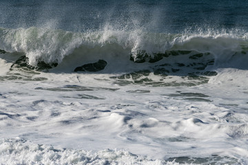 Wall Mural - Foamy Atlantic ocean water, Portugal coast.