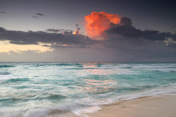 Wall Mural - cloud igniting by morning sunlight above caribbean sea