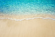 © OHishi_Foto - Soft blue ocean wave on clean sandy beach