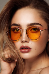 Wall Mural - Close up face of young girl wear sunglasses