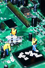 Conceptual diorama image of miniature figure workmen cleaning up binary data from a circuit board