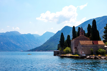 Wall Mural - Amazing landscape view of the mountains, the sea, the island of the Virgin on the Reef and the Island of St. George in Boka Kotorska Bay, Montenegro