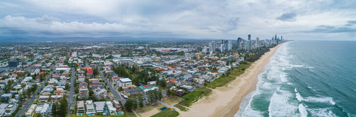Wall Mural - Aerial panorama of Mermaid Beach suburb and Gold Coast city skyline, Queensland, Australia