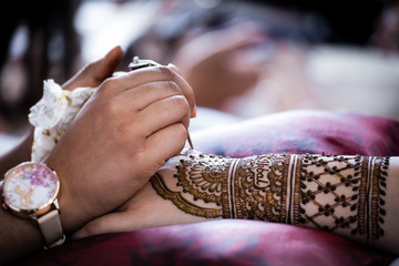 Indian bride's pre wedding henna mehendi close up