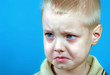 portrait of offended little boy. sad crying boy. resentment emotion. violence in family