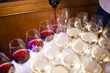 waiter pouring wine