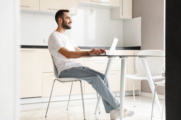 Wall Mural - Happy handsome man freelancer