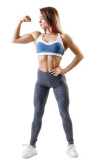 Wall Mural - Woman in sportswear demonstrated her muscular athletic body.