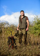 © be free - Make sure safe condition. Prepare for hunting. What you should have while hunting nature environment. Hunting equipment and safety measures. Man with rifle hunting equipment nature background