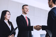 © khwanchai - successful negotiation and deal concept, shake hands and  of business people