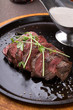 Grilled beef steak on frying pan