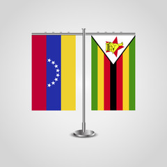 Wall Mural - Table stand with flags of Venezuela and Zimbabwe. Two flag. Flag pole. Symbolizing the cooperation between the two countries. Table flags