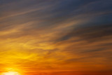 Fototapeta Zachód słońca - Fiery, orange and red colors sunset sky. Beautiful background