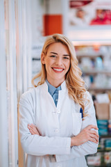 Wall Mural - Portrait of a beautiful smiling druggist.