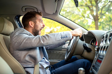 Wall Mural - Upset driver behind the steering wheel