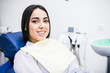 © F8  \ Suport Ukraine - Overview of dental caries prevention. Woman at the dentist's chair during a dental procedure. Beautiful Woman smile close up. Healthy Smile. Beautiful Female Smile