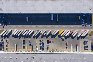 Aerial drone view on warehouse and logistic center. Logistic and transport concept