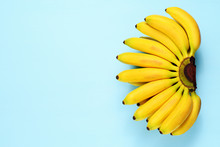 Baby Bananas On Blue Background