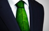 Fototapeta Kosmos - Ecology concept, business man with green leaf tie