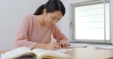 Wall Mural - Young Woman study at home