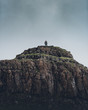 Man reached a hilltop in scotland summit goal success overlook panorama