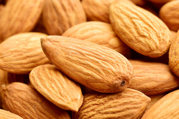 Sticker - close-up image of almonds, macro, texture.