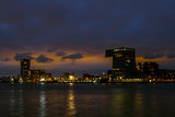 Fototapeta  - Beautiful view of the city center of Rotterdam. Erasmus bridge over the river Meuse. Rotterdam city center in the evening. ROTTERDAM, HOLLAND.