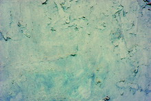 Background Of A Blue Stucco Coated And Painted Exterior, Rough Cast Of Cement And Concrete Wall Texture