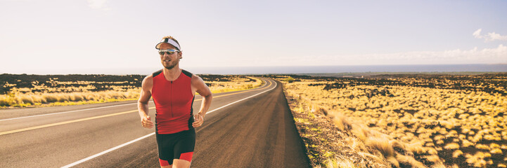 Sticker - Running man training for triathlon sport run race in Hawaii. Banner panorama landscape sunset nature, triathlete runner jogging.