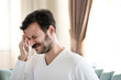 © Hazal - Young man with headache
