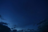 Fototapeta Kamienie - black cloud on blue night sky