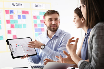 Young business people at meeting in office