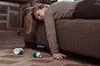 Blonde-haired woman falling asleep after taking too many pills