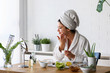© lordn - Young woman cleaning face with natural cosmetics. Clean fresh skin care.