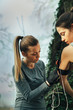 © GAGO IMAGES - Two young beautiful woman exercise in the forest