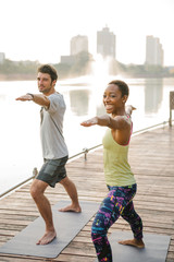 Yoga couple in the park