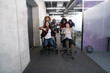 © .shock - multiethnics business team racing on office chairs