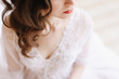 © paralisart - Girl with red lips in profile. Close-up portrait of a young woman. Wedding details. Morning of the bride.