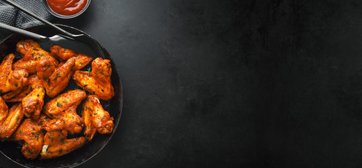 Wall Mural - Chicken wings grilled in sauce on pan