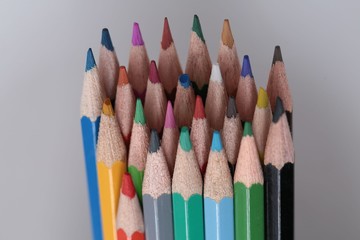 Colour pencils isolated on white background close up 