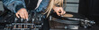 © LIGHTFIELD STUDIOS - panoramic shot of dj woman standing near dj mixer and vinyl record