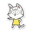 © lineartestpilot - sticker of a happy cartoon cat in dress pointing