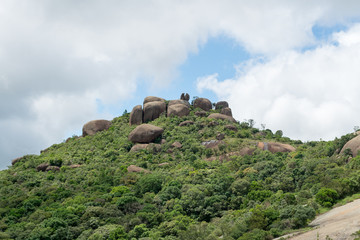 Rocky landscape in Pedra Grande Park in Atibaia, Sao Paulo, Brazil. On the top of the mountain there is a rock split in two struck by a lighting